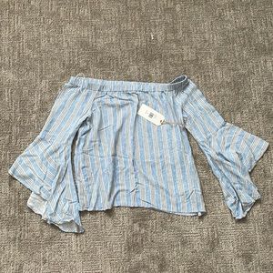 New Blue off the shoulder blouse. With tags